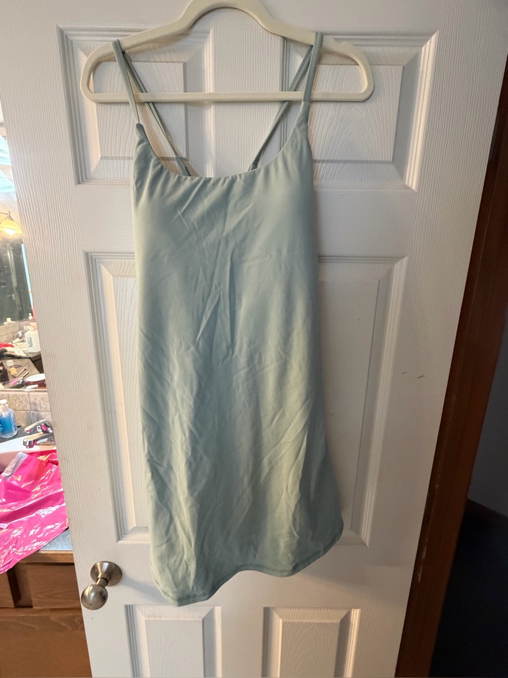 Halara active dress featuring thin adjustable straps, a built-in shelf bra, and